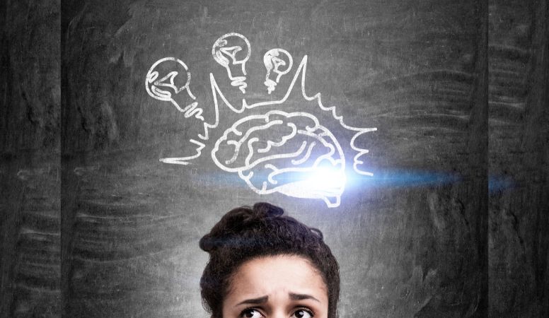 Woman with anxious brain image above head representing how hypnotherapy can help ease anxiety